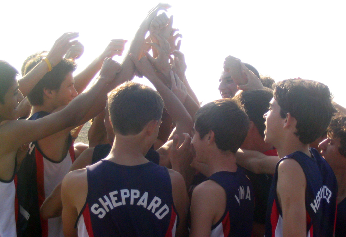 JV boys arms raised