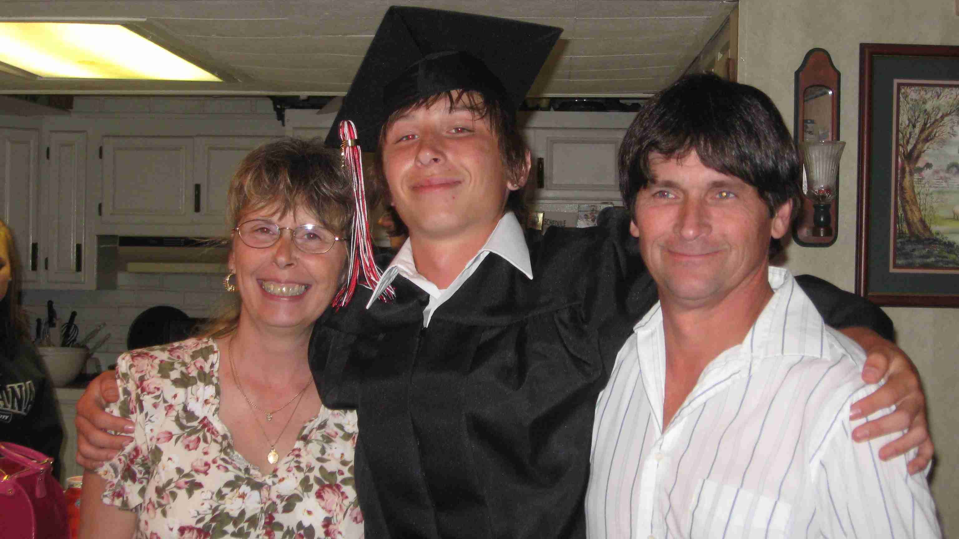 Me My wife and son on his Graduation day