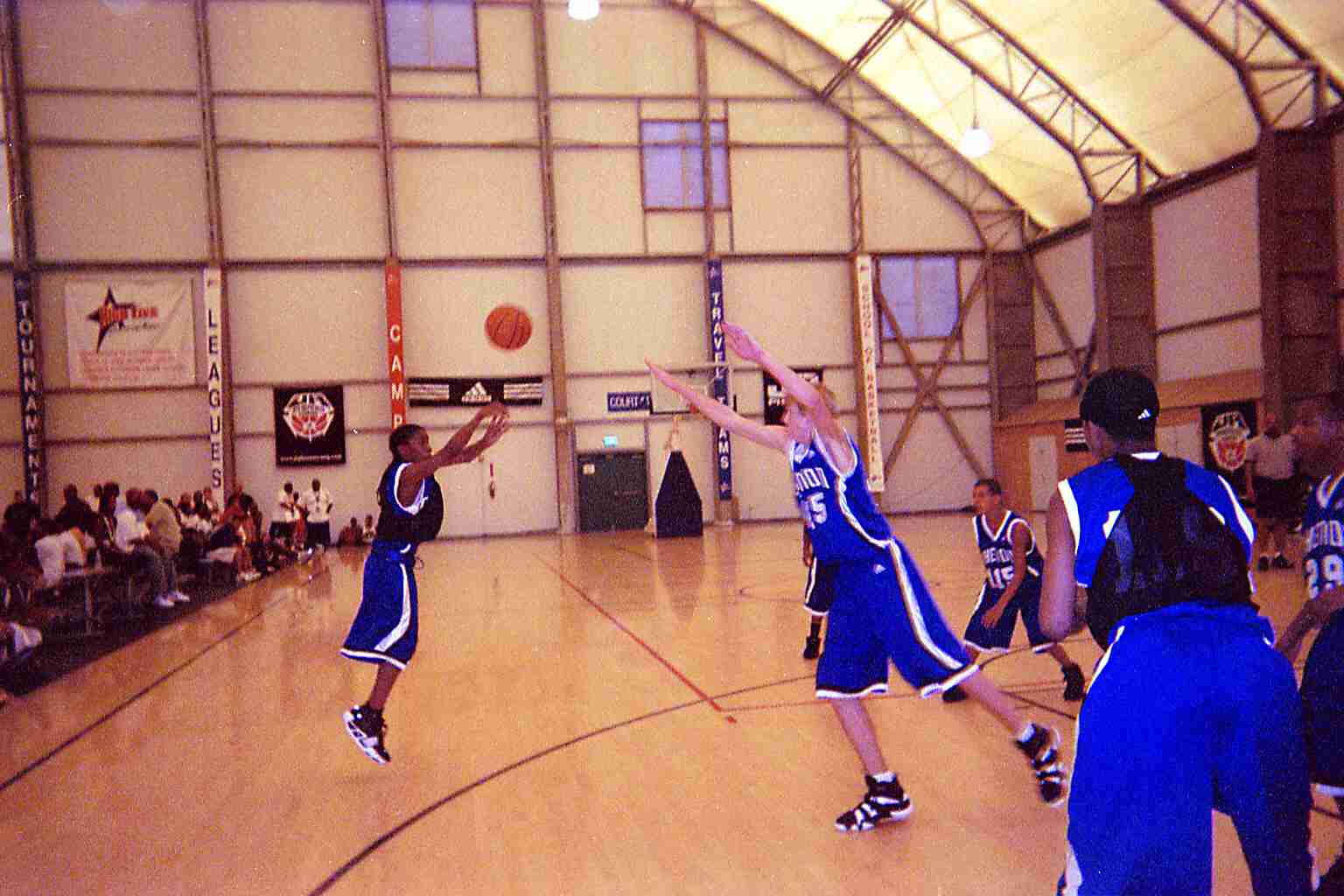 Joey Raises up over  6ft7 Zach Peters