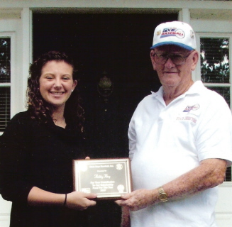 Ashley King receives plaque