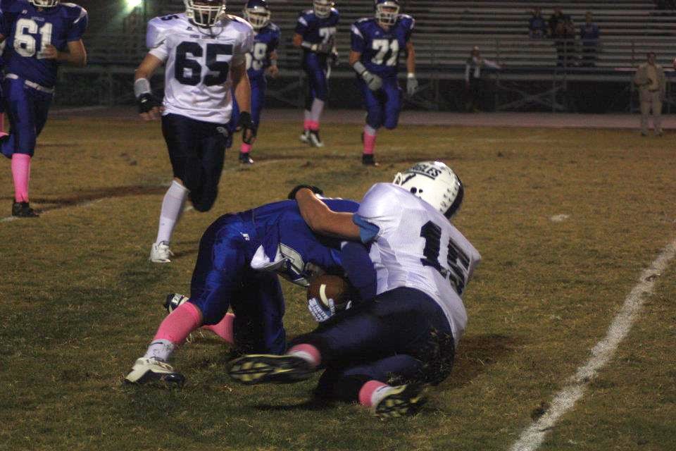 app sanders tackle.jpg