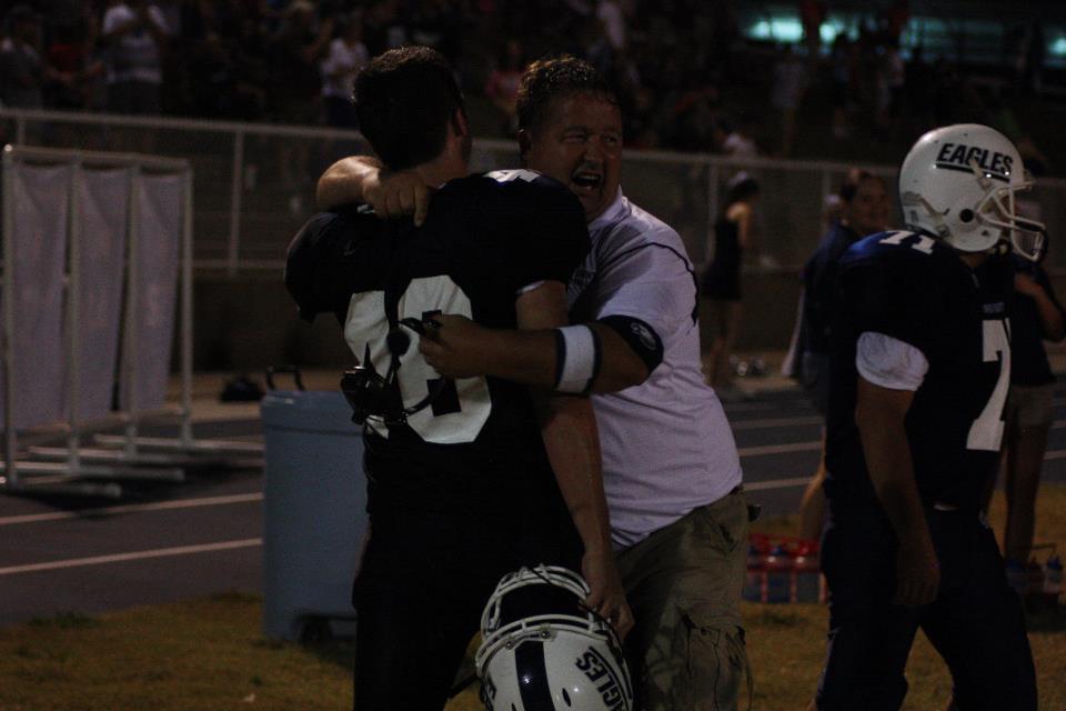 cc larry g with caleb celebrate.jpg